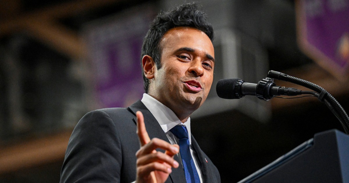 Vivek Ramaswamy speaking into a microphone while gesturing with his right hand during a campaign event in Vandalia, Ohio.