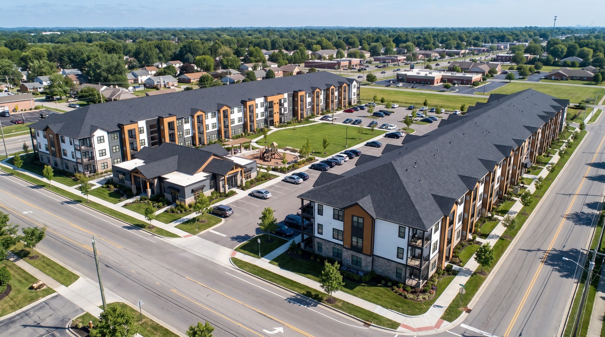 Conceptual aerial rendering of two three-story apartment buildings and a central parking lot at West Broad Street and Georgesville Road.