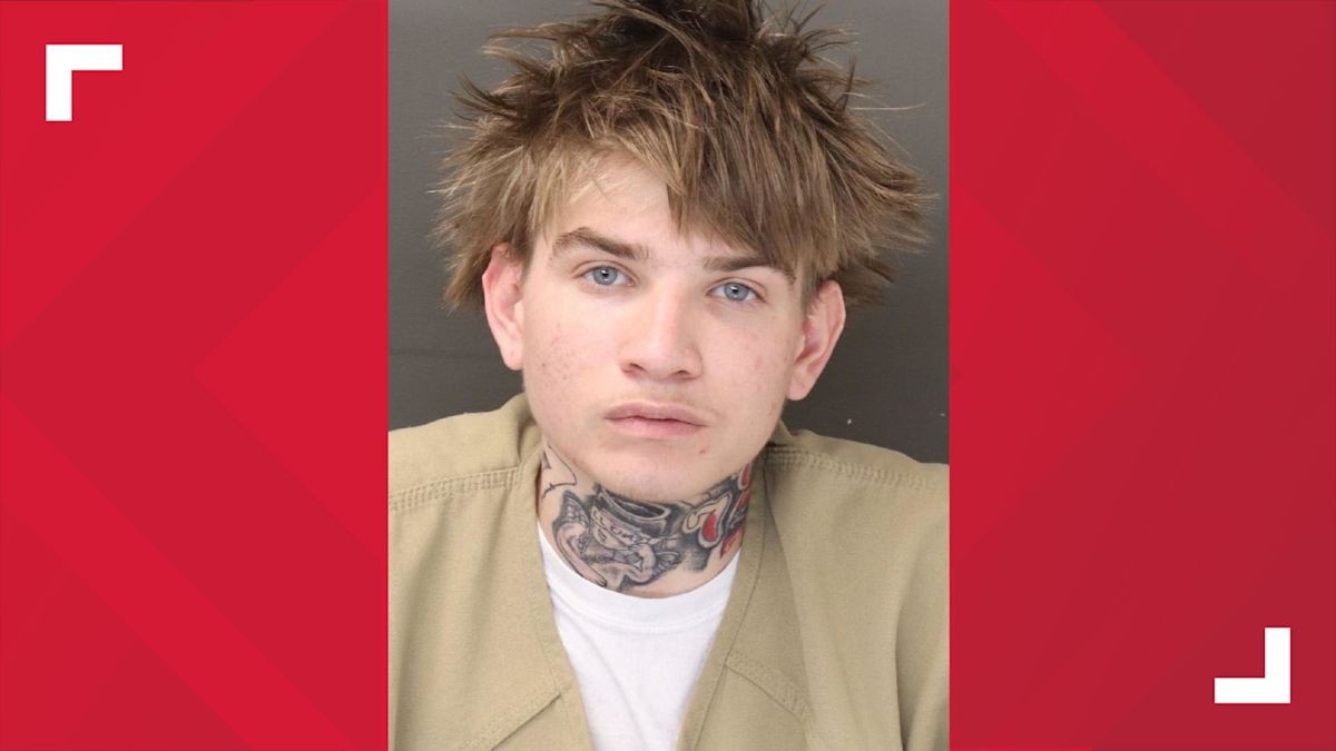 Franklin County booking photograph of Jacob Driscoll, showing a young man with shaggy brown hair, a tan inmate uniform, and a neck tattoo.